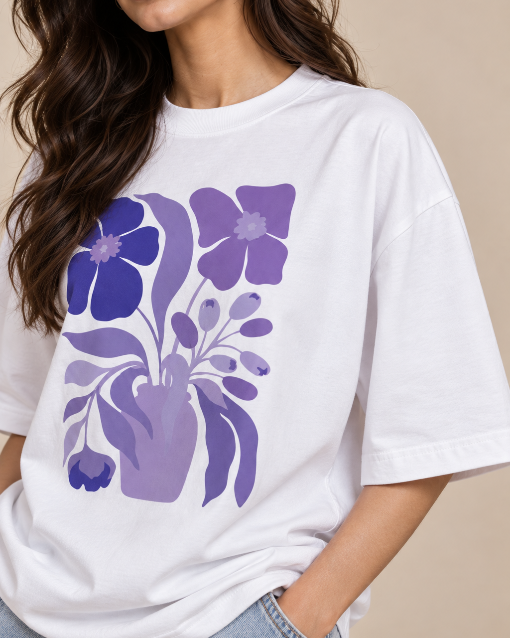 Purple and lavender flower illustration printed on a white graphic T-shirt