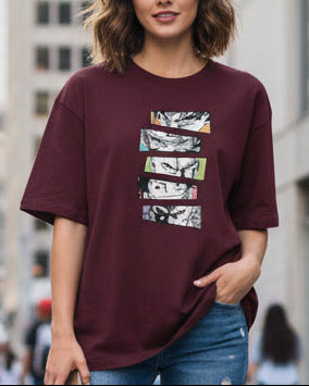 Burgundy/Maroon oversized T-shirt featuring five stacked black-and-white manga-style eye illustrations with colourful accent panels styled with baggy pants.