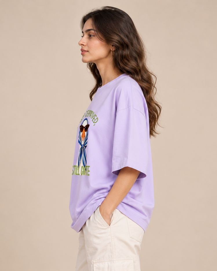 Lavender duck graphic oversized T-shirt styled with baggy jeans