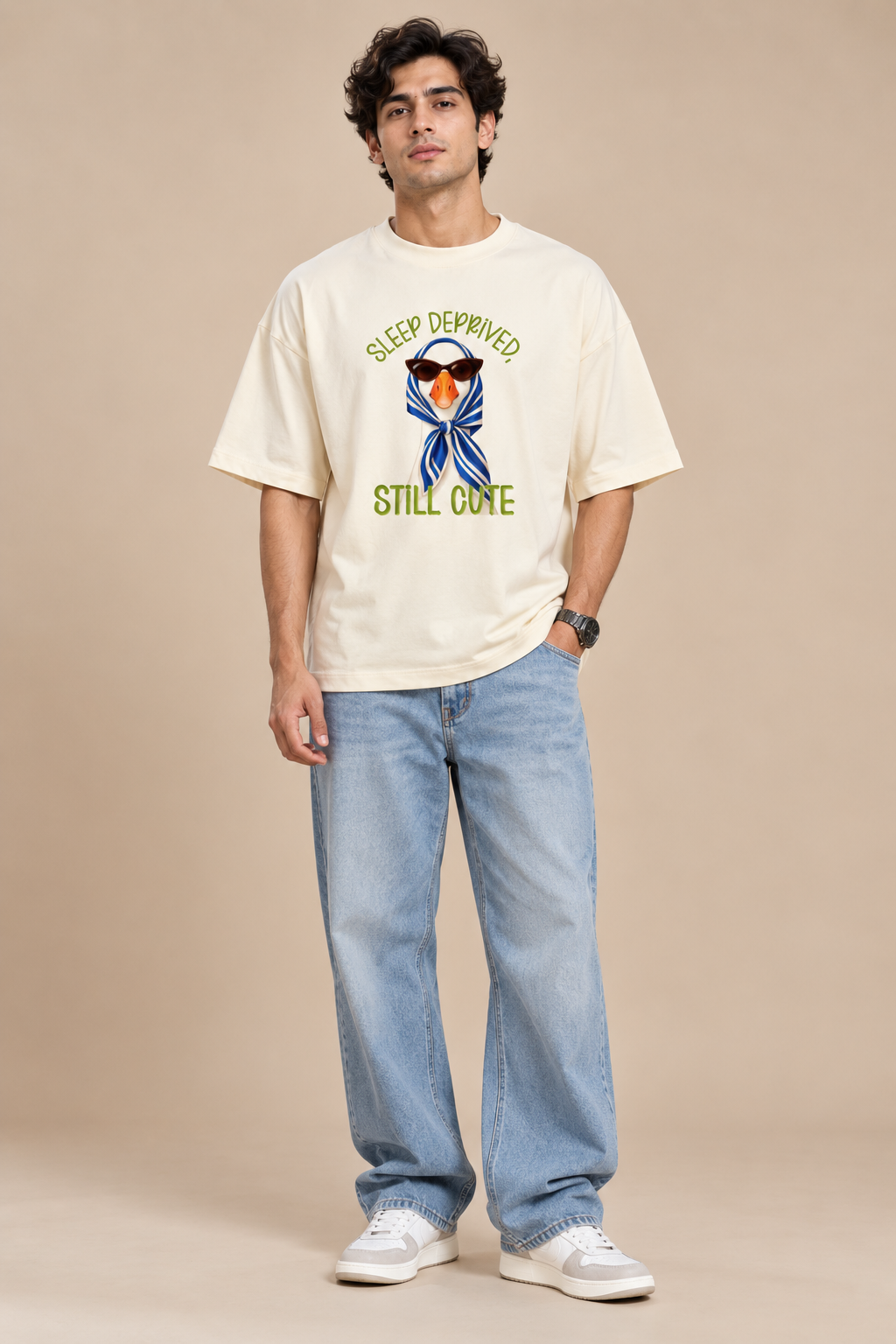 Styling an ivory duck graphic oversized T-shirt with casual streetwear