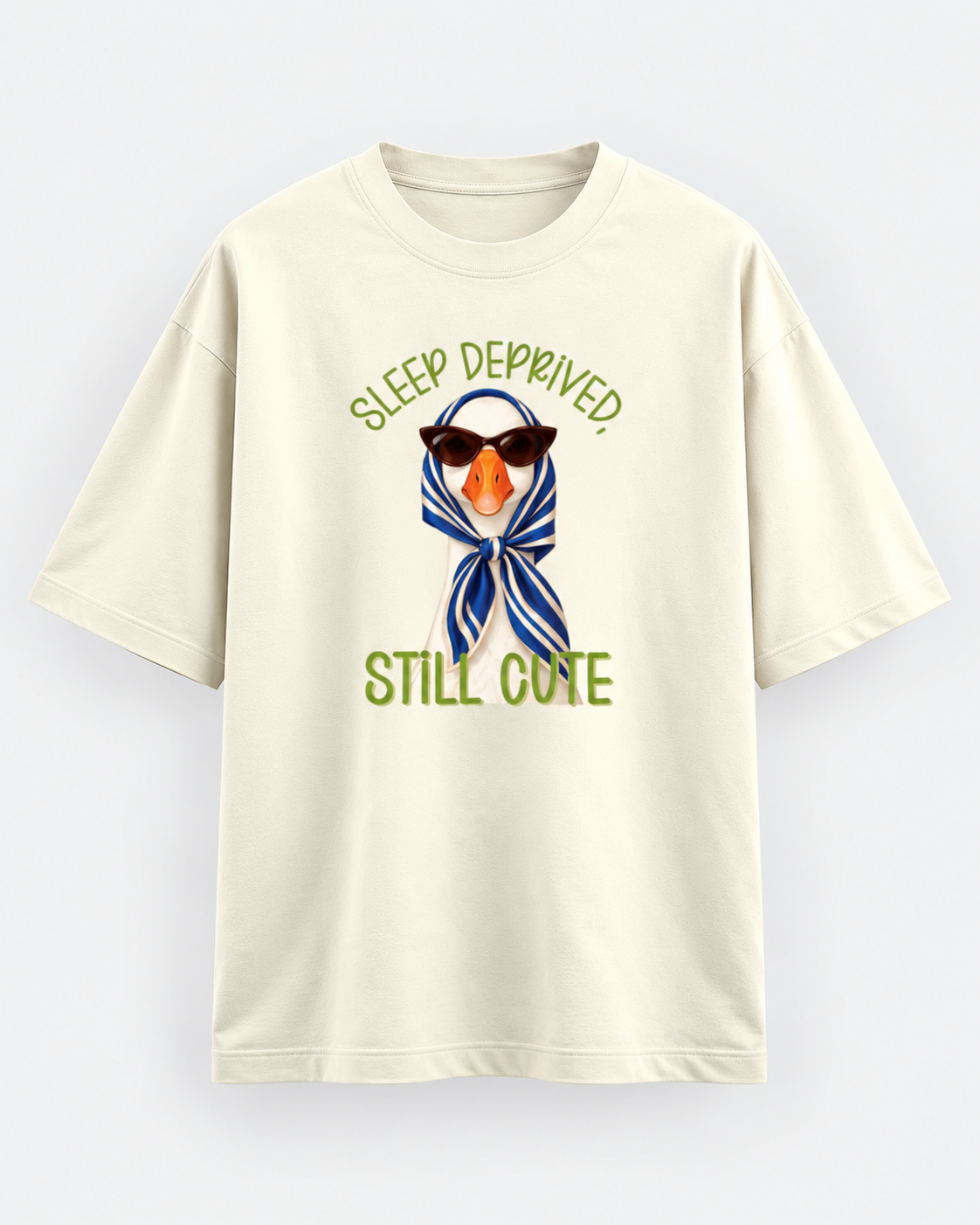 Ivory oversized duck graphic T-shirt with Sleep Deprived Still Cute print