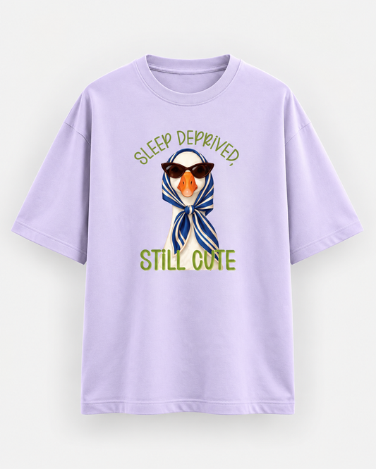 Lavender oversized T-shirt with Sleep Deprived Still Cute duck graphic